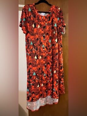 LuLaRoe Carly Orange Geometric Dress with Teal and Black Accents